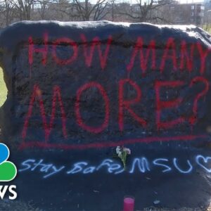 MSU students lay flowers at memorial for shooting victims