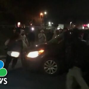 Sideshow mob attacks Sacramento family minivan