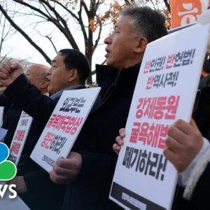Protesters oppose new plan to compensate enslaved Koreans