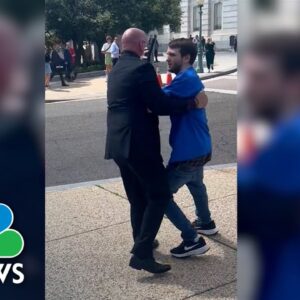 Watch: Rep. Higgins pushes activist away from press conference in D.C.