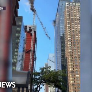 WATCH: Crane catches fire in NYC and plummets onto Midtown street