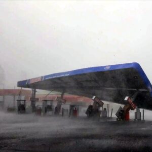 Watch: Gas station awning topples under Idalia's winds